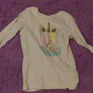 A long sleeve with a unicorn on it it doesn’t fit me anymore